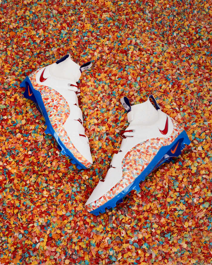 LeBron James' white and orange Nike cleats in Pebbles cereal.